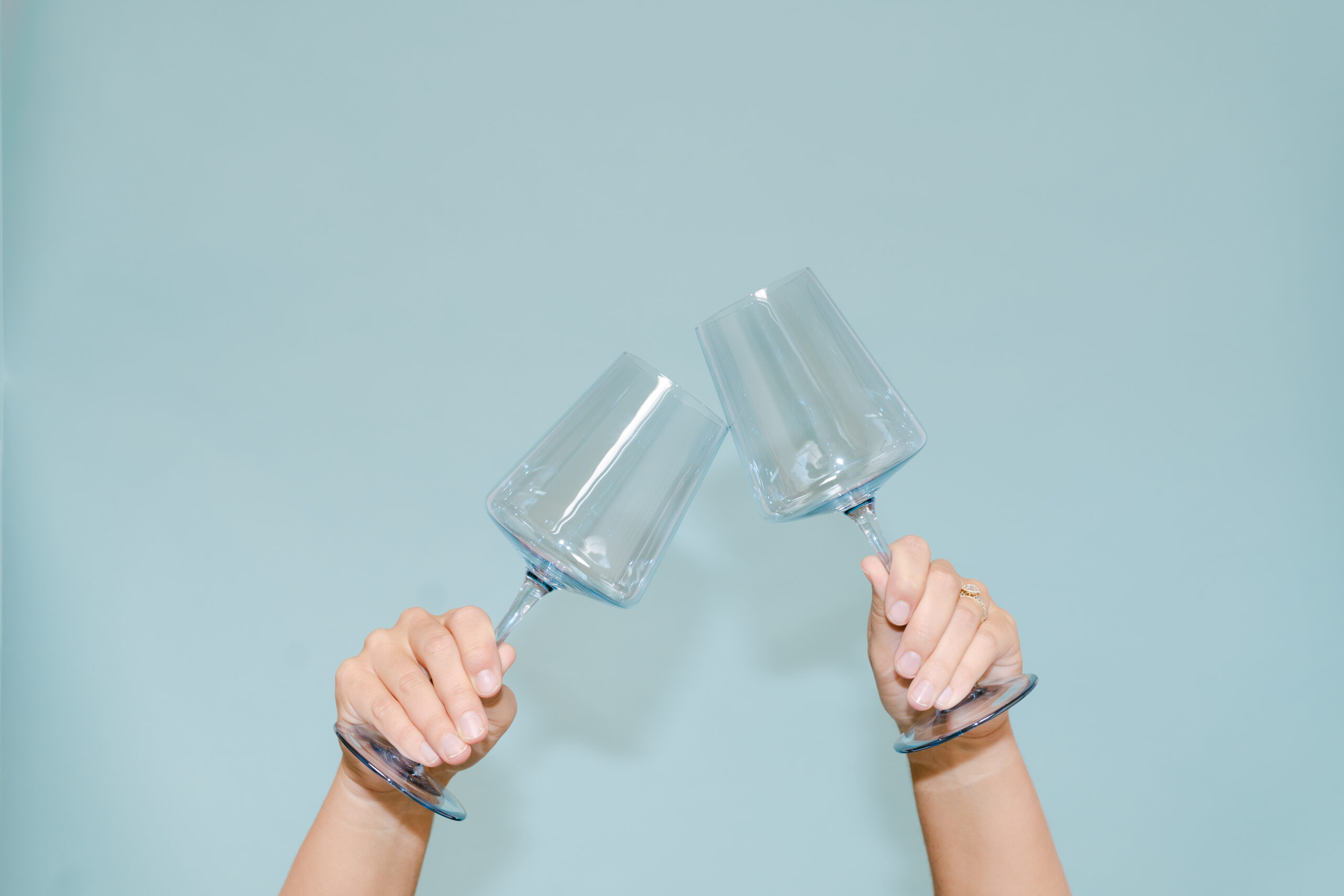 wine glasses cheers, blue glasses, website launch