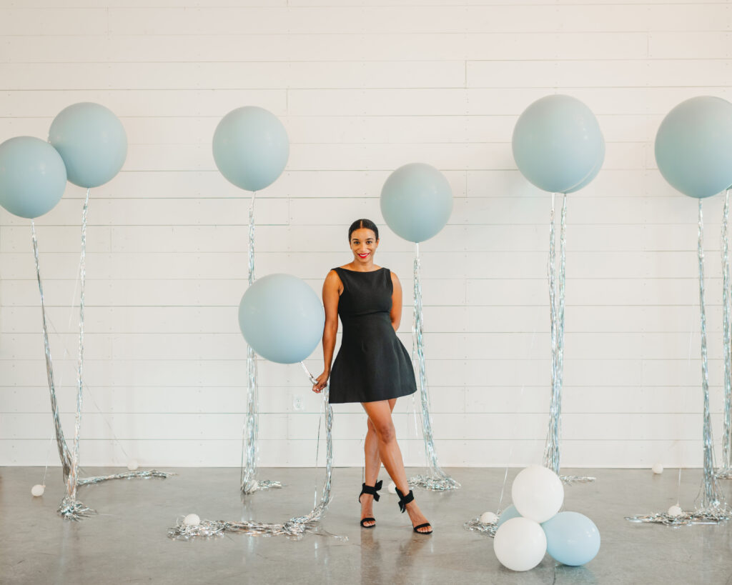 balloon artist setting up a corporate event
